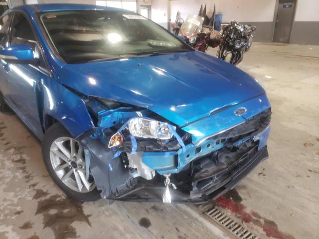 Photo 9 from auction – 2015 FORD FOCUS SE with VIN 1FADP3K24FL233339