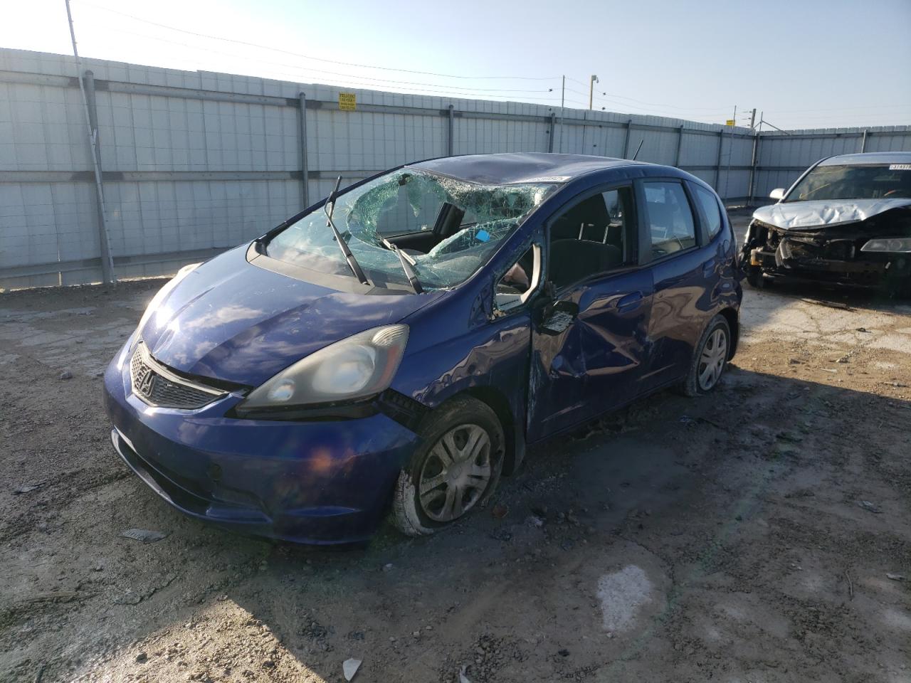 Photo 2 from auction – 2009 HONDA FIT with VIN JHMGE88249S058973