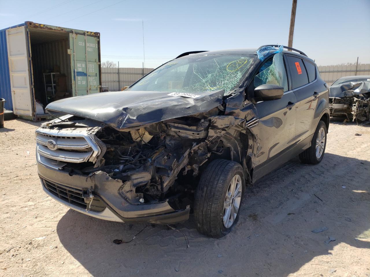 Photo 2 from auction – 2018 FORD ESCAPE SE with VIN 1FMCU9GD2JUC28151