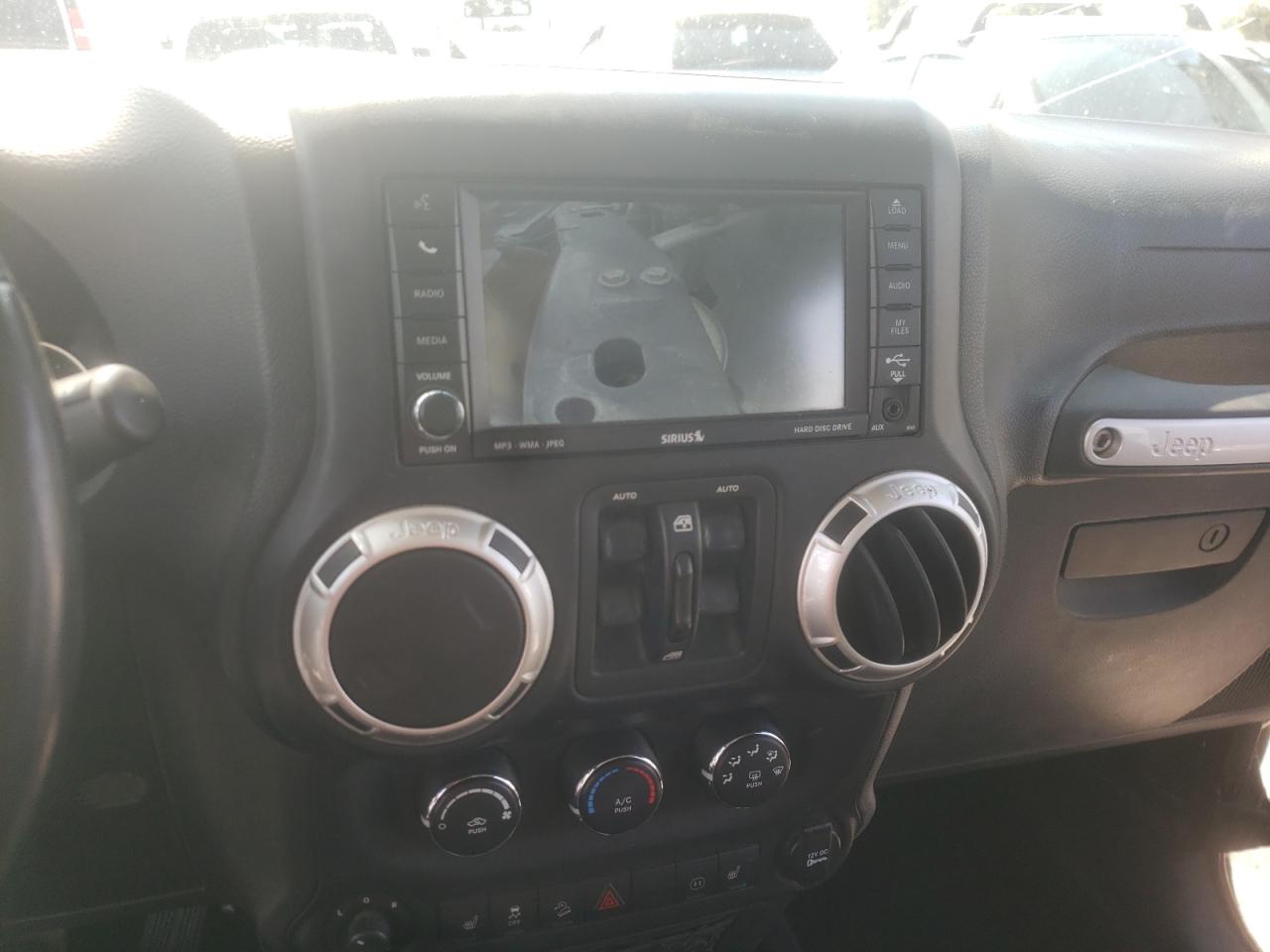 Photo 9 from auction – 2011 JEEP WRANGLER U with VIN 1J4BA7H14BL581672