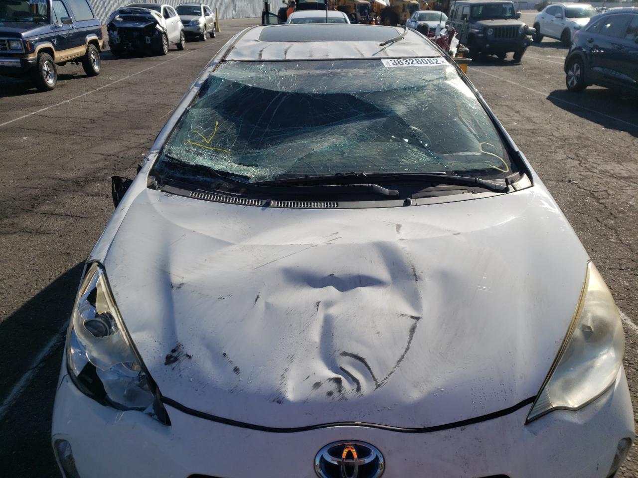 Photo 10 from auction – 2012 TOYOTA PRIUS C with VIN JTDKDTB35C1002301