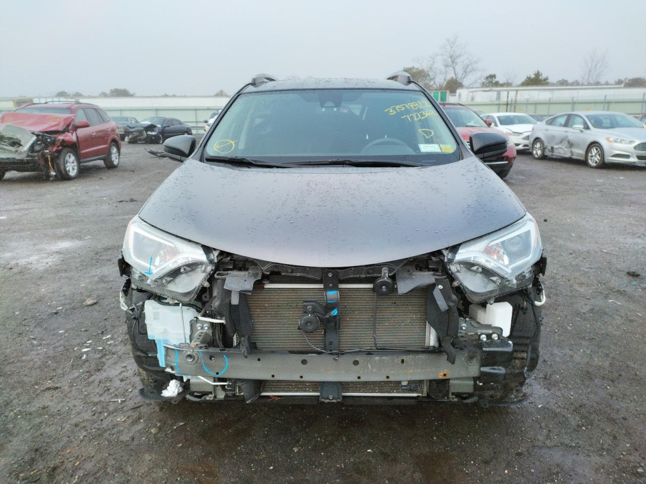 Photo 9 from auction – 2018 TOYOTA RAV4 LE with VIN JTMBFREV4JJ722602