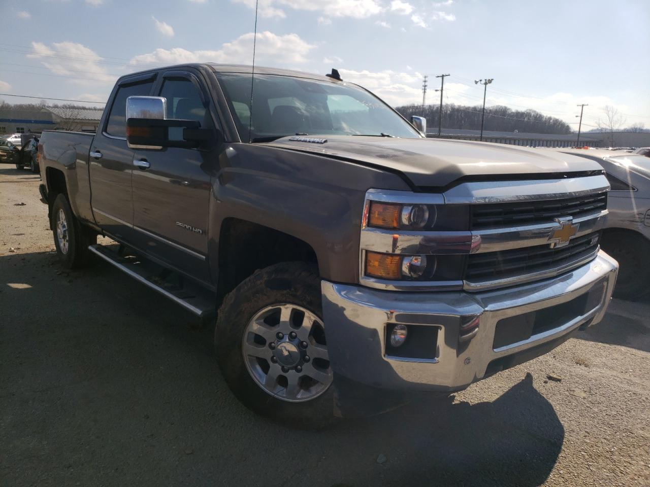 CHEVROLET SILVERADO 2015 with VIN 1GC1KWE85FF574261 - Photo from auction