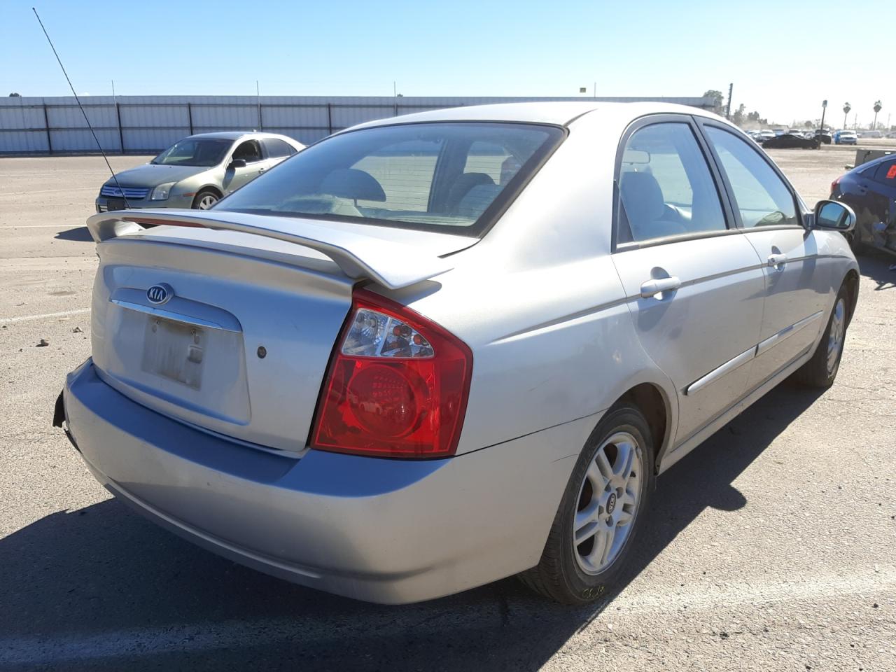 Photo 4 from auction – 2004 KIA SPECTRA LX with VIN KNAFE121745042162