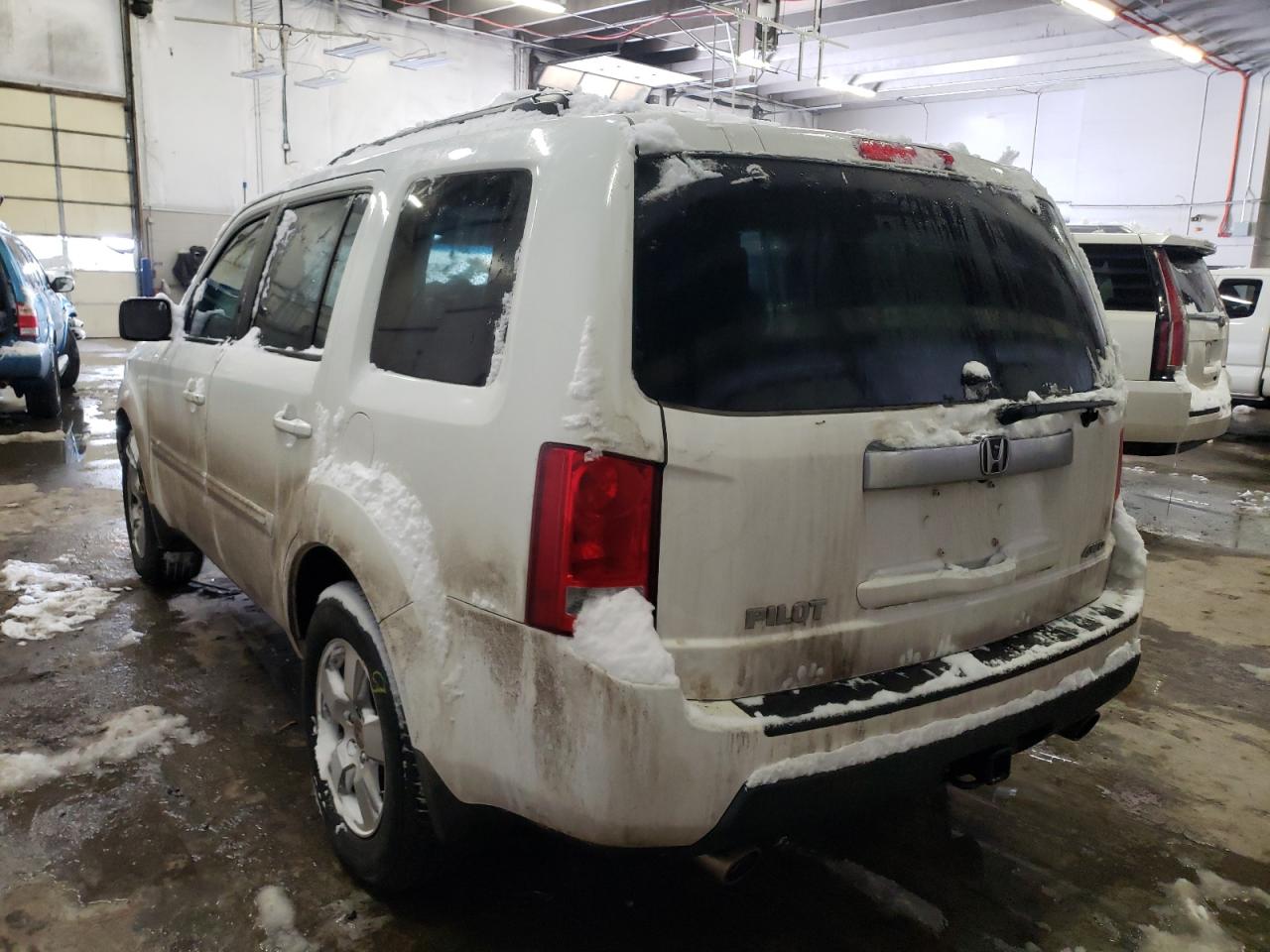 Photo 3 from auction – 2010 HONDA PILOT EXL with VIN 5FNYF4H58AB033078