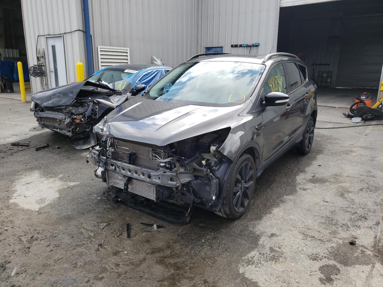 Photo 2 from auction – 2017 FORD ESCAPE TIT with VIN 1FMCU9J92HUD49762