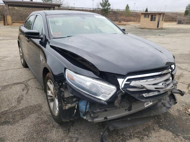 FORD TAURUS SEL 2014 with VIN 1FAHP2E80EG125089 - Photo from auction