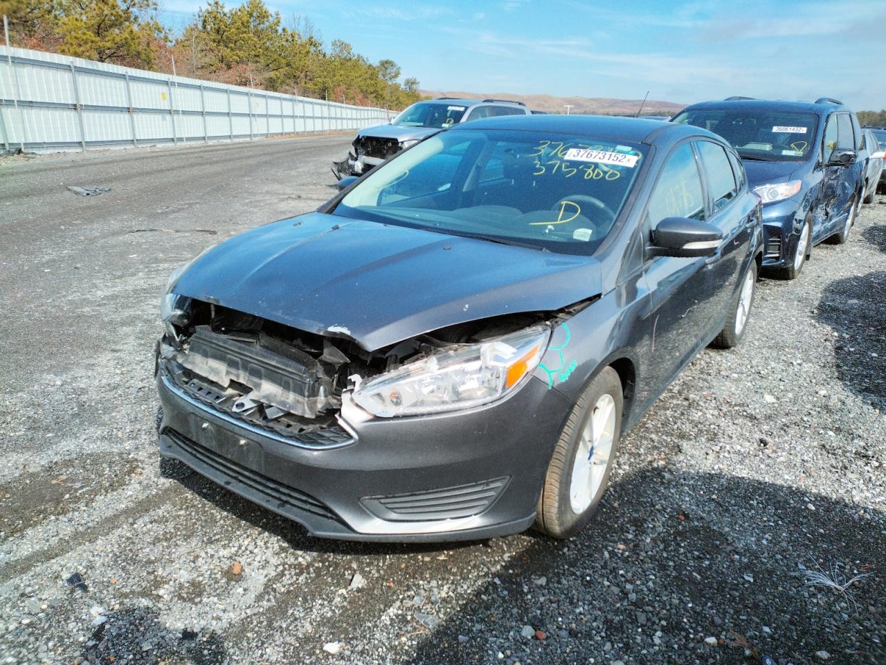Photo 2 from auction – 2016 FORD FOCUS SE with VIN 1FADP3K23GL375800