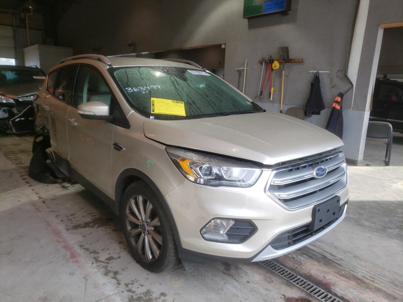 FORD ESCAPE TIT 2017 with VIN 1FMCU0J97HUA64566 - Photo from auction