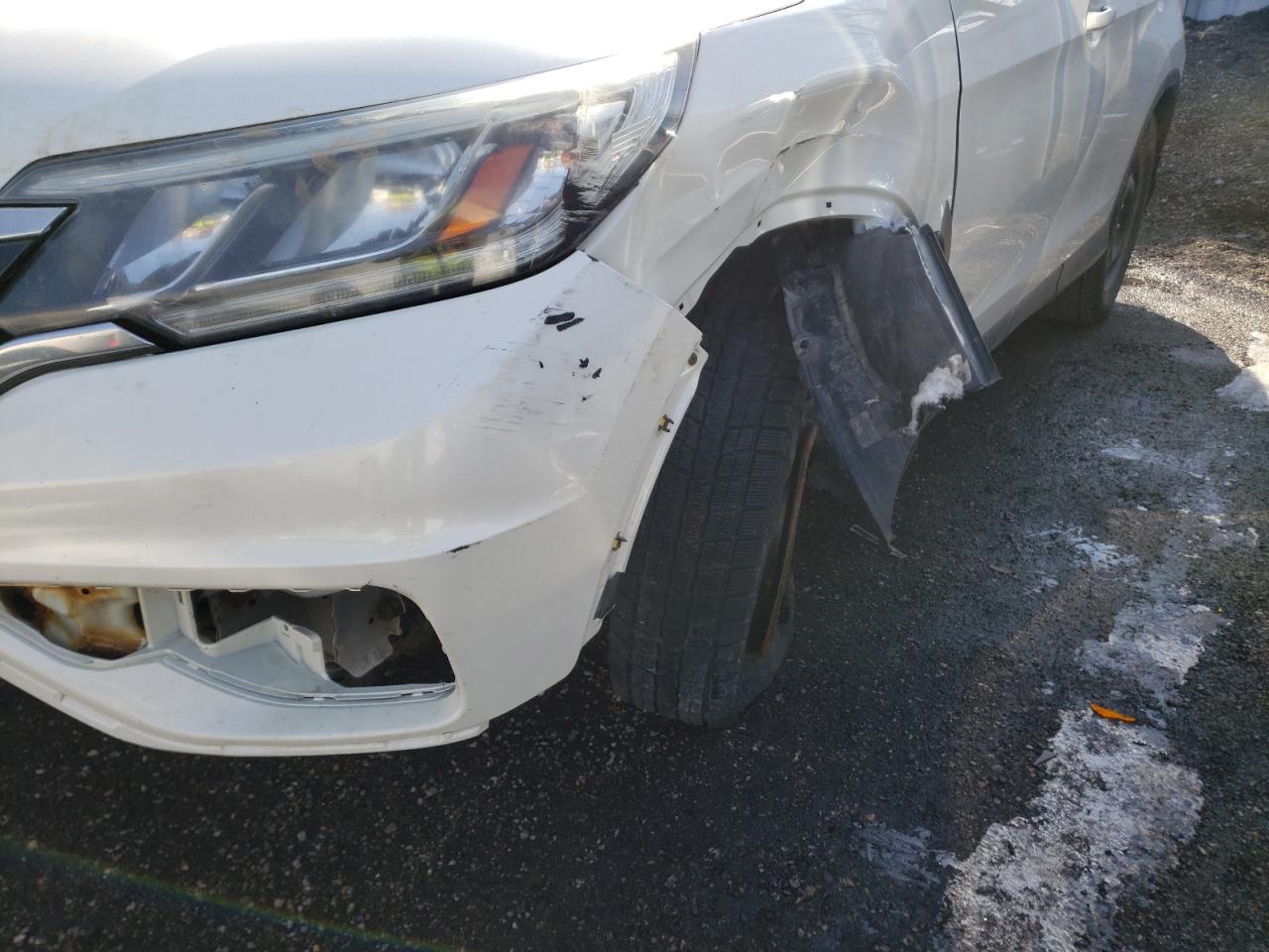 Photo 9 from auction – 2015 HONDA CR-V SE with VIN 2HKRM4H47FH107424