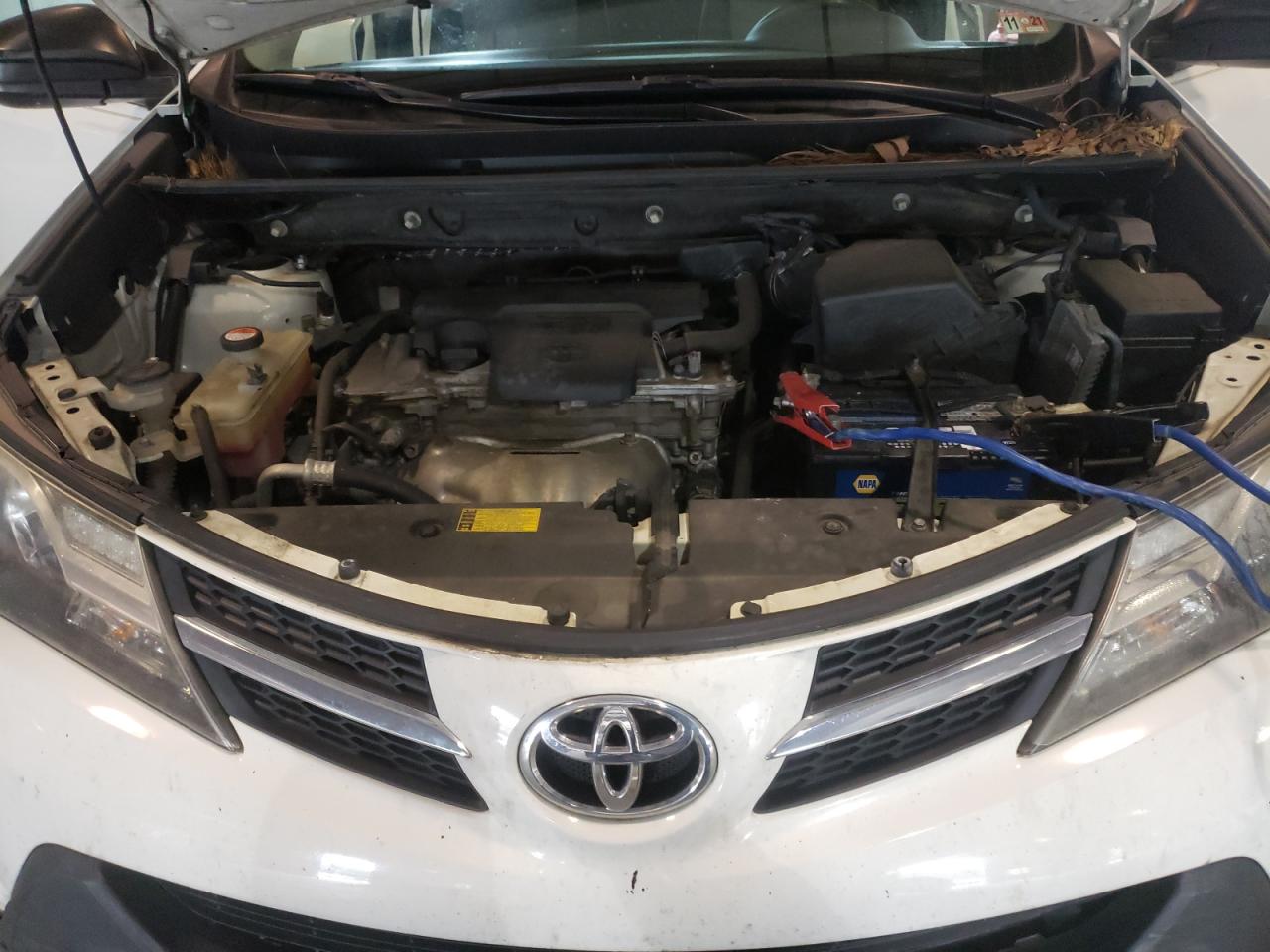 Photo 7 from auction – 2014 TOYOTA RAV4 LE with VIN JTMZFREV6EJ021242
