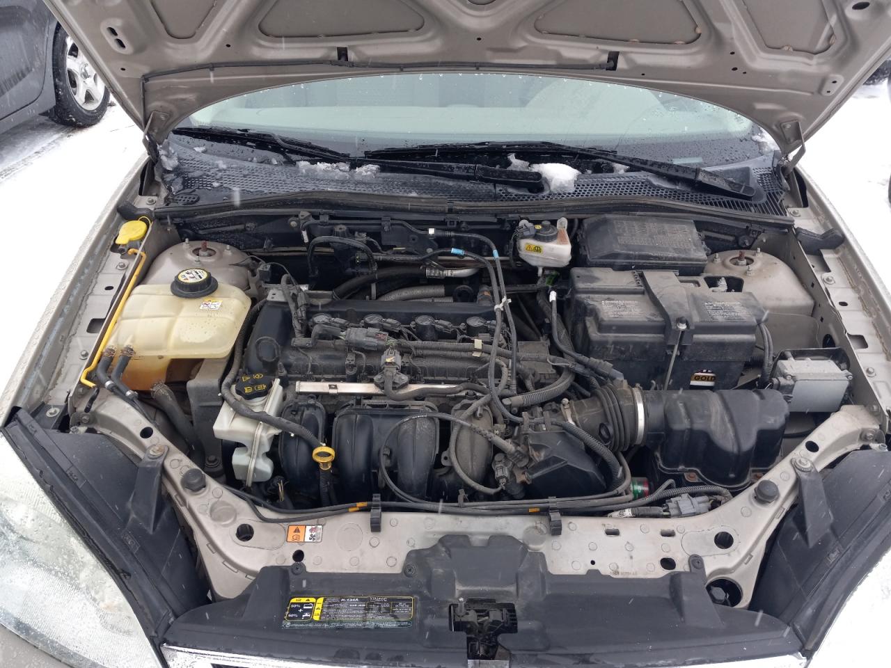 Photo 7 from auction – 2007 FORD FOCUS ZX4 with VIN 1FAFP34N97W356439