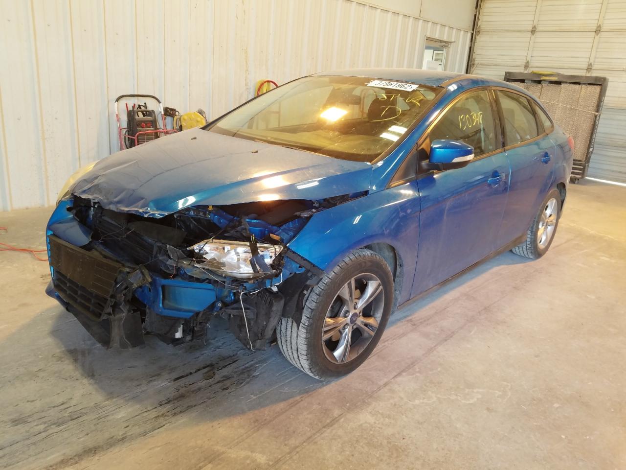 Photo 2 from auction – 2014 FORD FOCUS SE with VIN 1FADP3F21EL137967