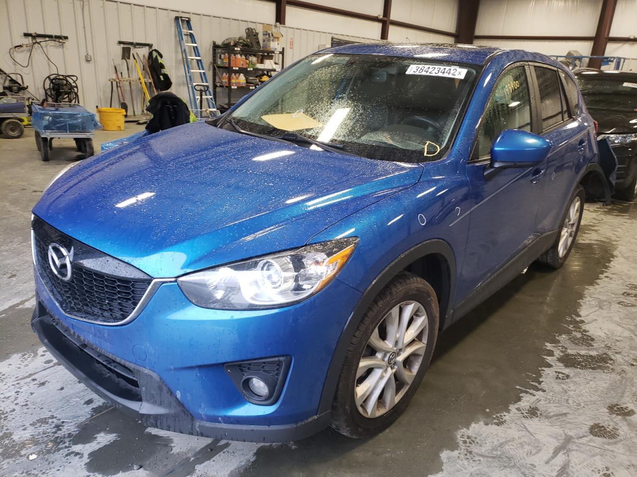 Photo 2 from auction – 2013 MAZDA CX-5 GT with VIN JM3KE4DEXD0141890