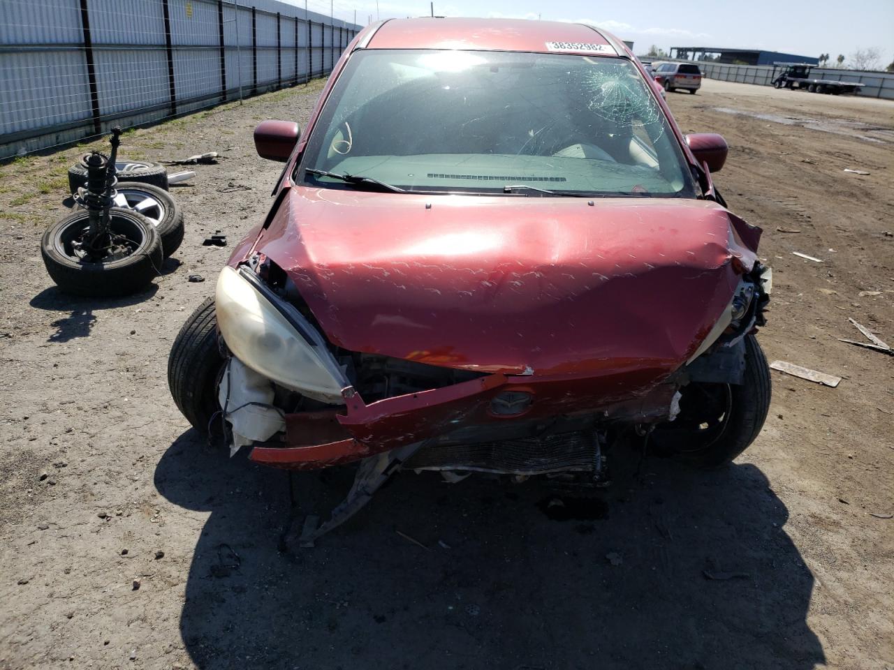 Photo 9 from auction – 2012 MAZDA 5 with VIN JM1CW2BL4C0114425