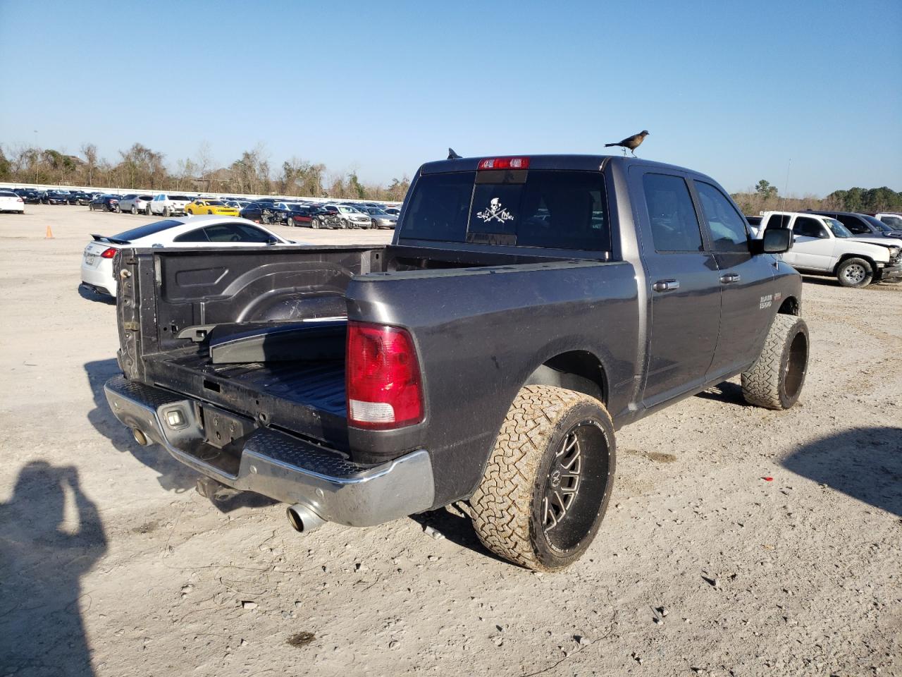 Photo 4 from auction – 2016 RAM 1500 SLT with VIN 1C6RR6LT9GS127826