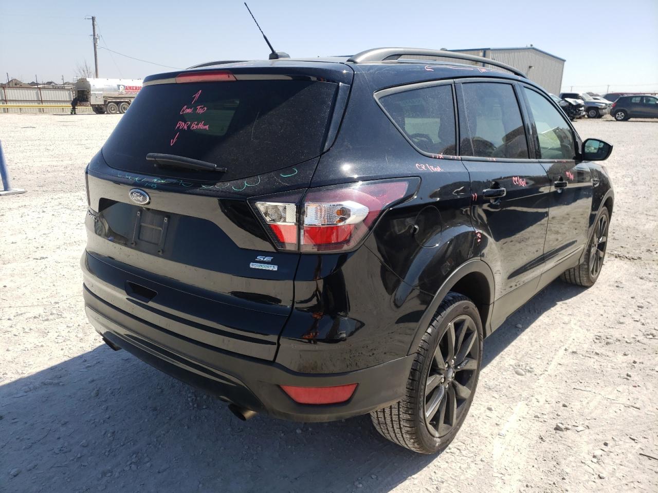 Photo 4 from auction – 2018 FORD ESCAPE SE with VIN 1FMCU0GD2JUC18859