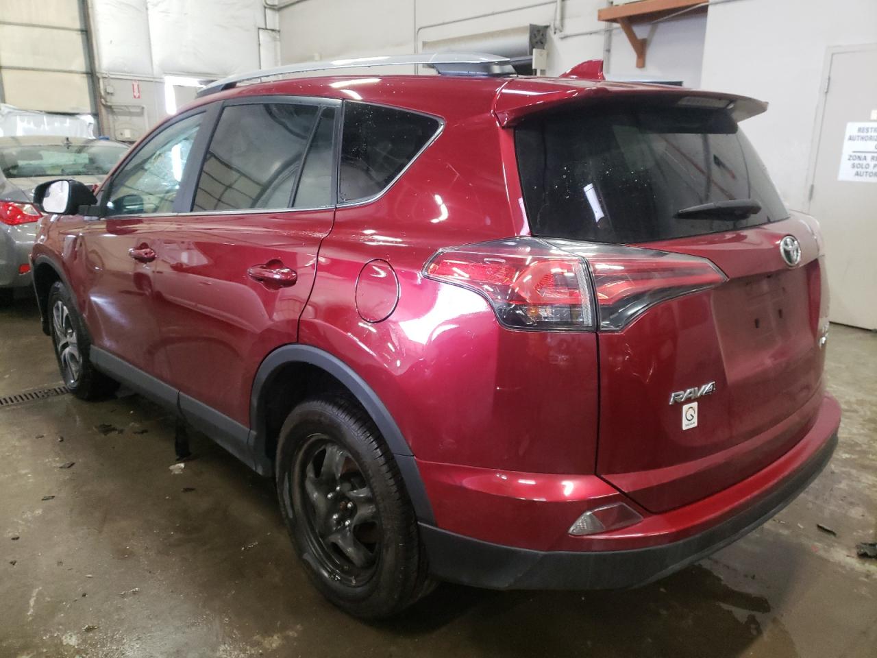 Photo 3 from auction – 2018 TOYOTA RAV4 LE with VIN 2T3BFREV8JW851251
