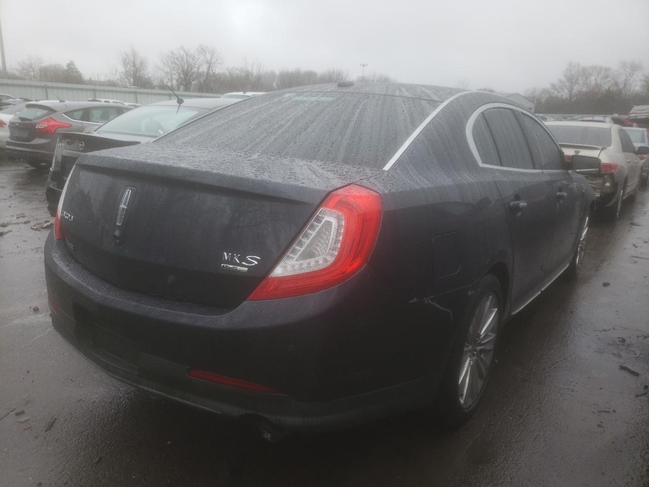 Photo 4 from auction – 2013 LINCOLN MKS with VIN 1LNHL9FTXDG608553
