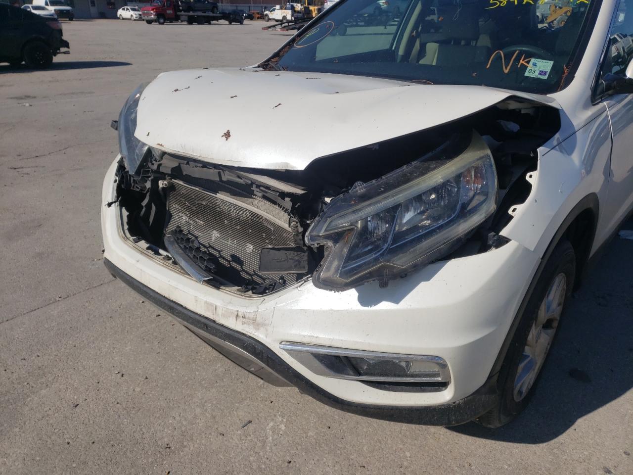 Photo 9 from auction – 2015 HONDA CR-V EX with VIN 5J6RM3H52FL024931