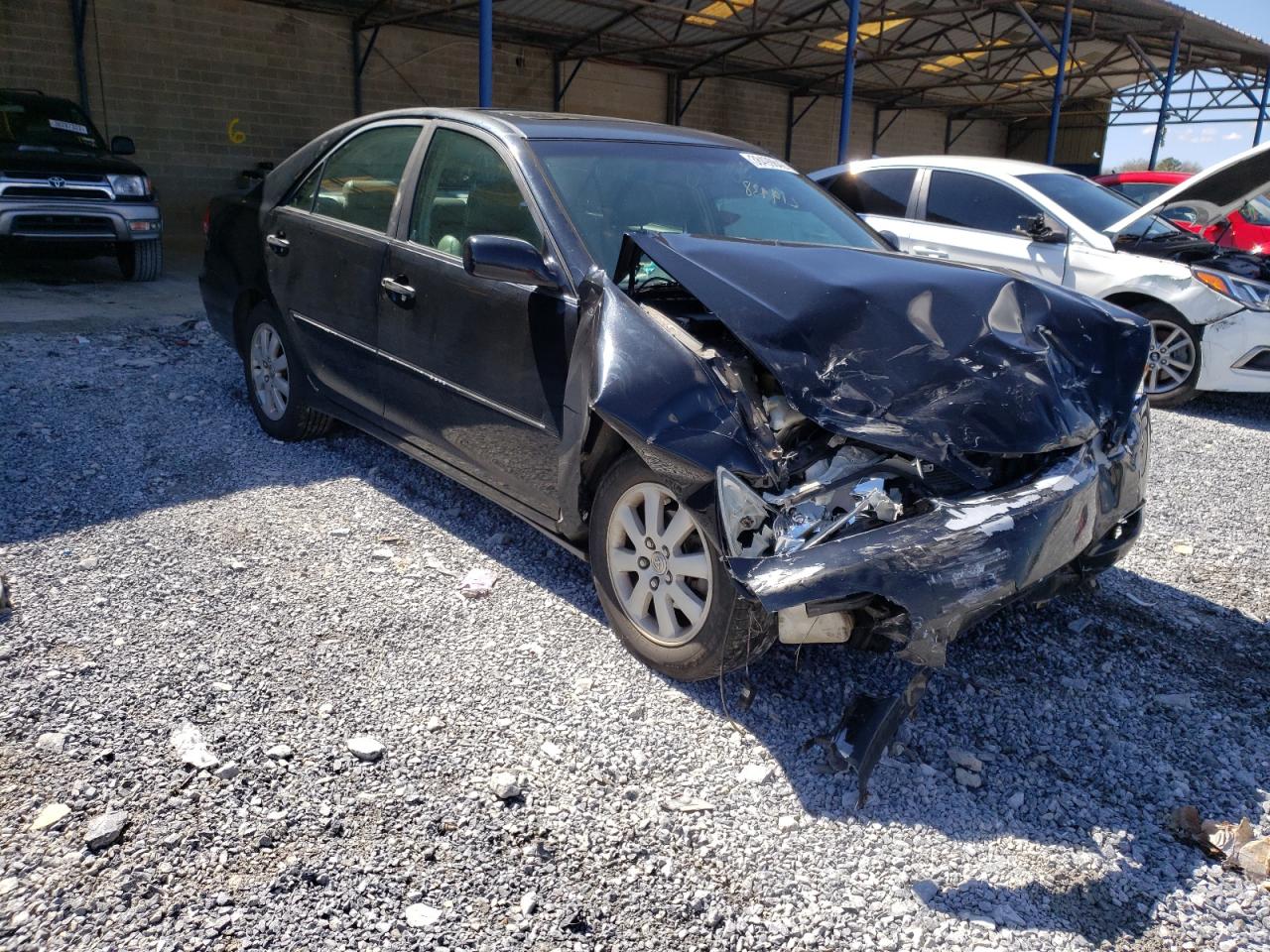 TOYOTA CAMRY LE 2003 with VIN 4T1BE30K23U153503 - Photo from auction