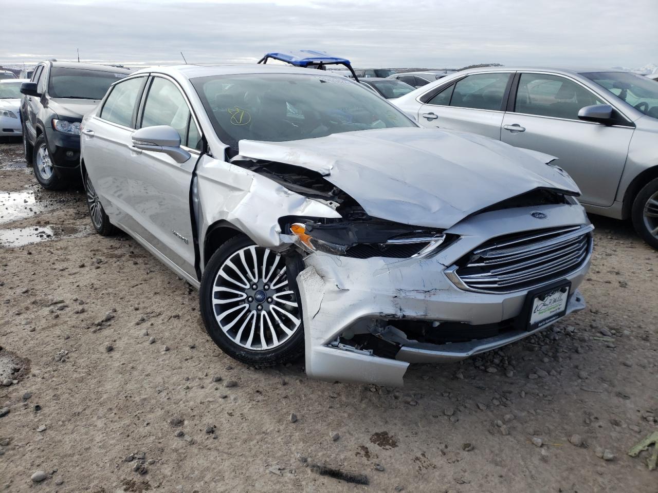 FORD FUSION TIT 2018 with VIN 3FA6P0RU3JR101374 - Photo from auction