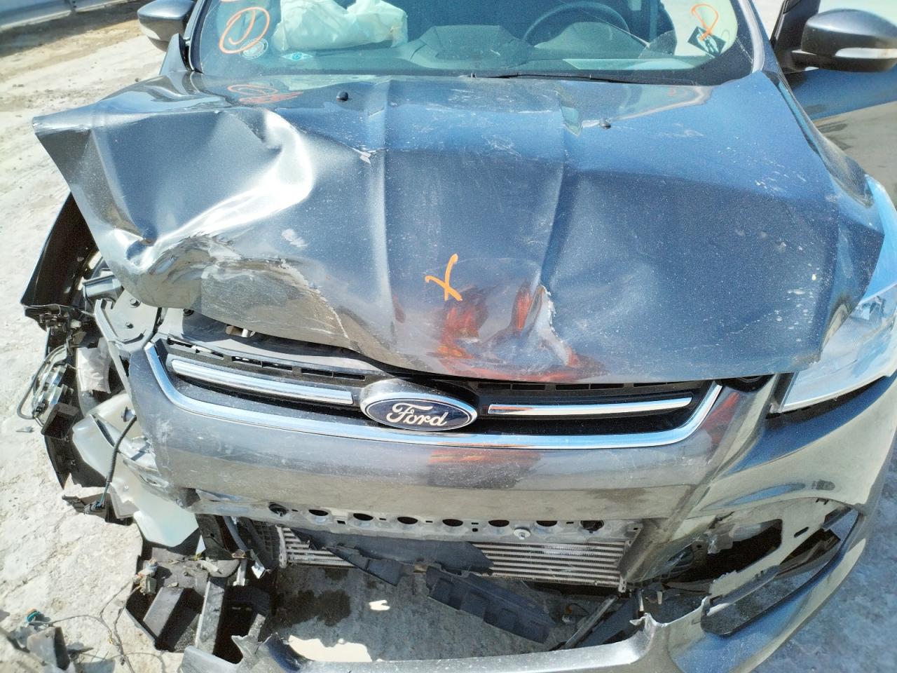 Photo 7 from auction – 2015 FORD ESCAPE TIT with VIN 1FMCU0J94FUB16054