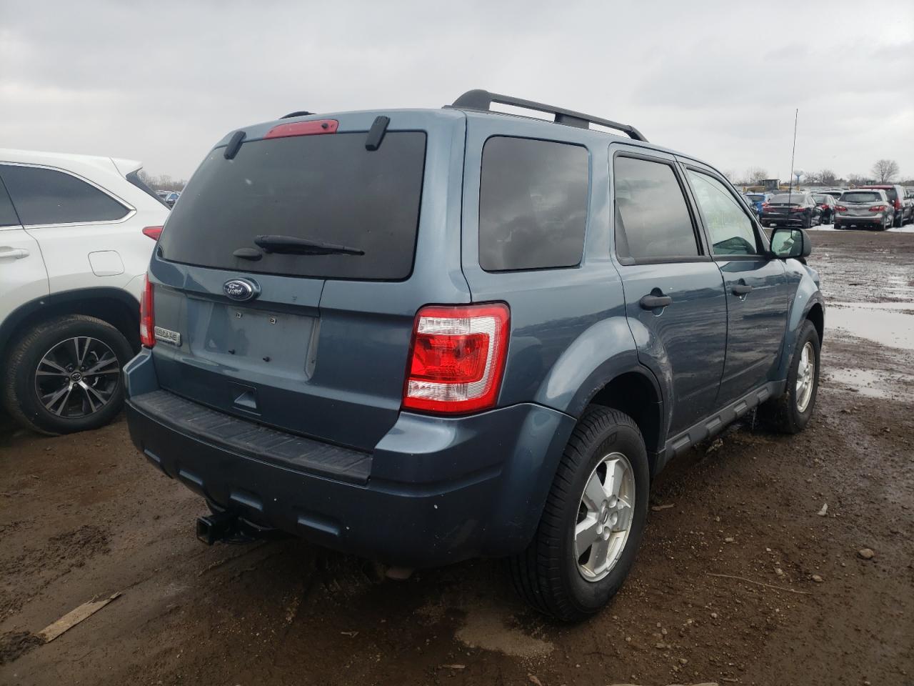 Photo 4 from auction – 2011 FORD ESCAPE XLT with VIN 1FMCU0D73BKB20290