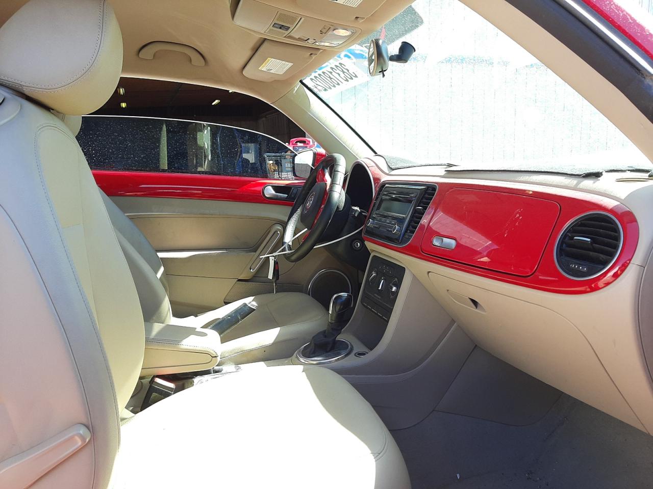 Photo 5 from auction – 2013 VOLKSWAGEN BEETLE with VIN 3VWJP7AT0DM678457