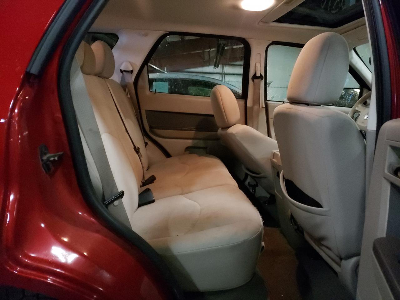 Photo 6 from auction – 2010 MERCURY MARINER with VIN 4M2CN8B75AKJ09478
