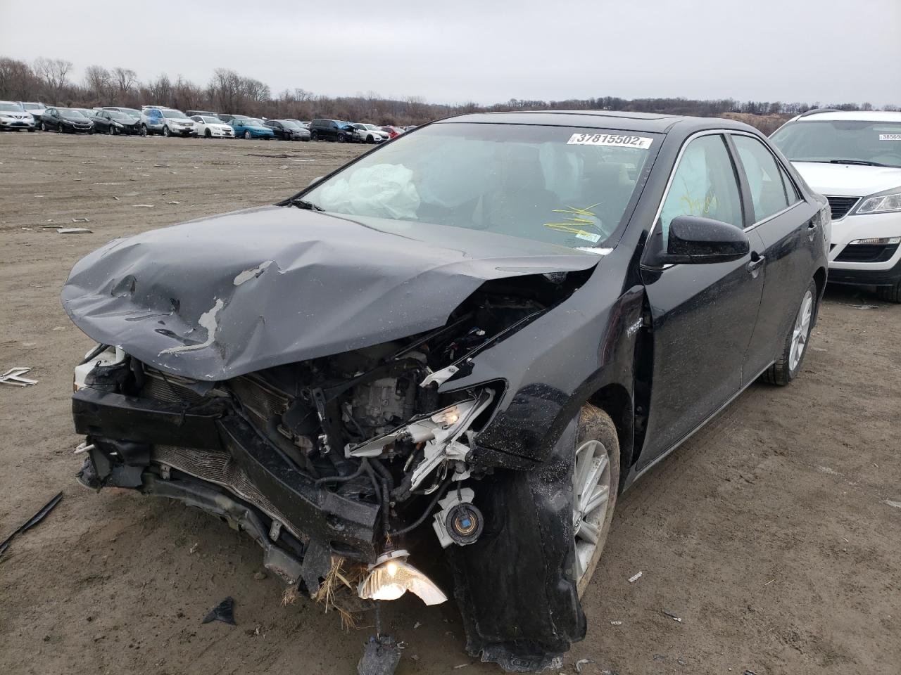Photo 2 from auction – 2012 TOYOTA CAMRY HYBR with VIN 4T1BD1FK8CU034126