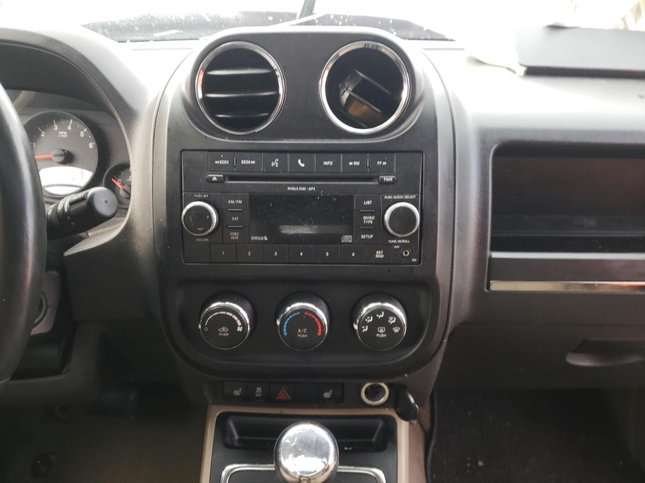 Photo 9 from auction – 2011 JEEP COMPASS SP with VIN 1J4NT1FB3BD189907