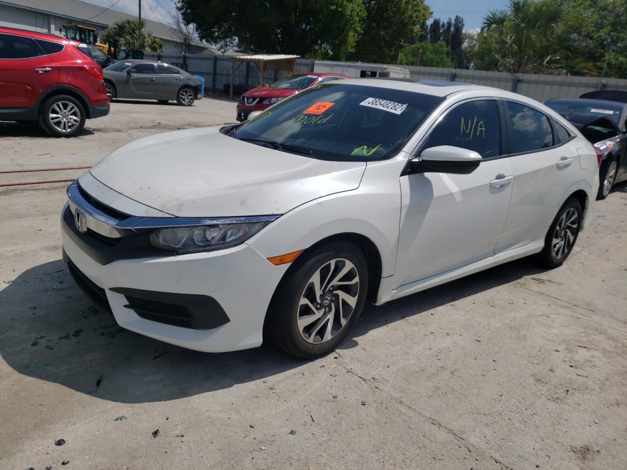 Photo 15 from auction – 2016 HONDA CIVIC EX with VIN 19XFC2F70GE070648
