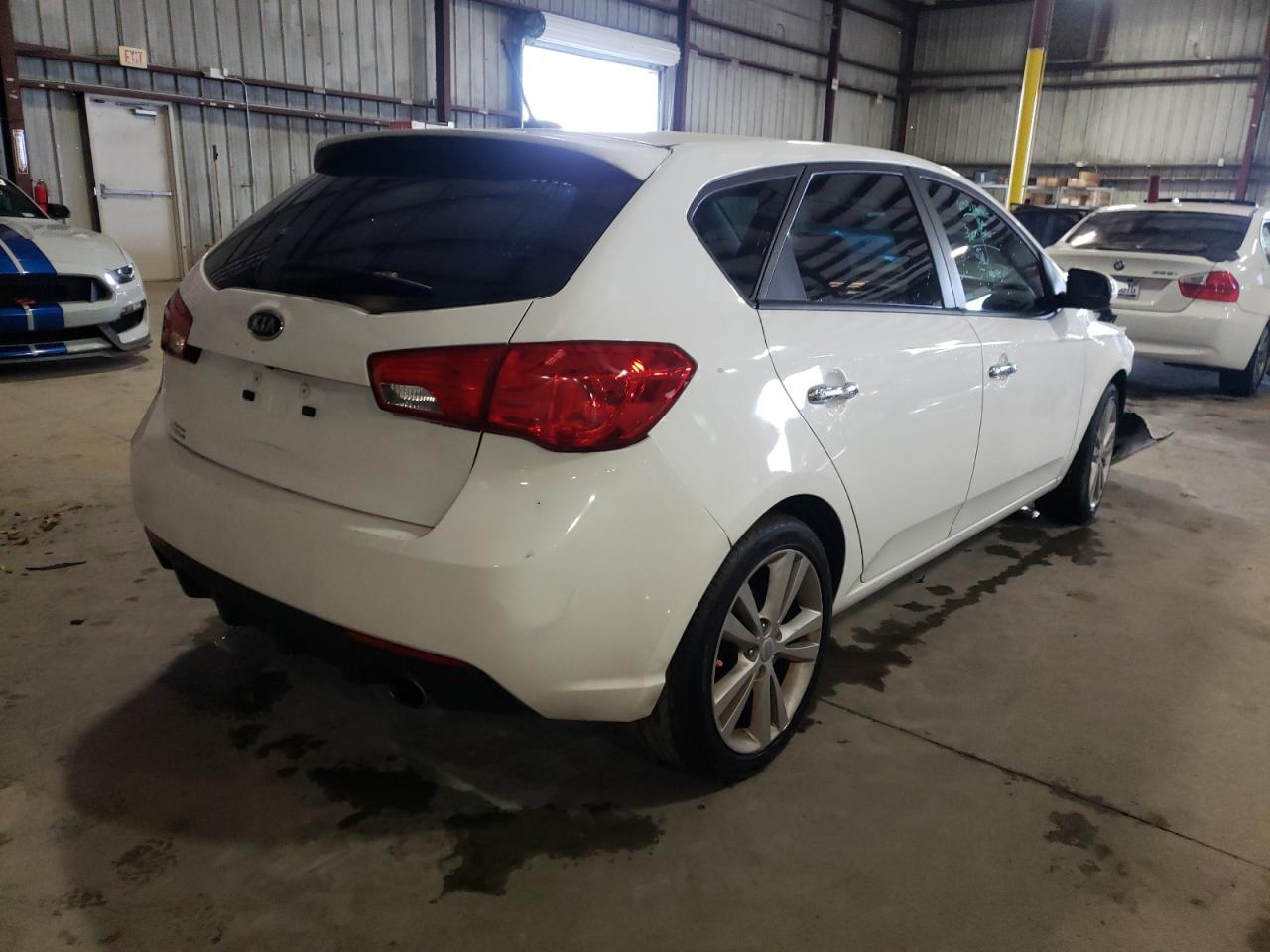 Photo 4 from auction – 2012 KIA FORTE SX with VIN KNAFW5A38C5480145