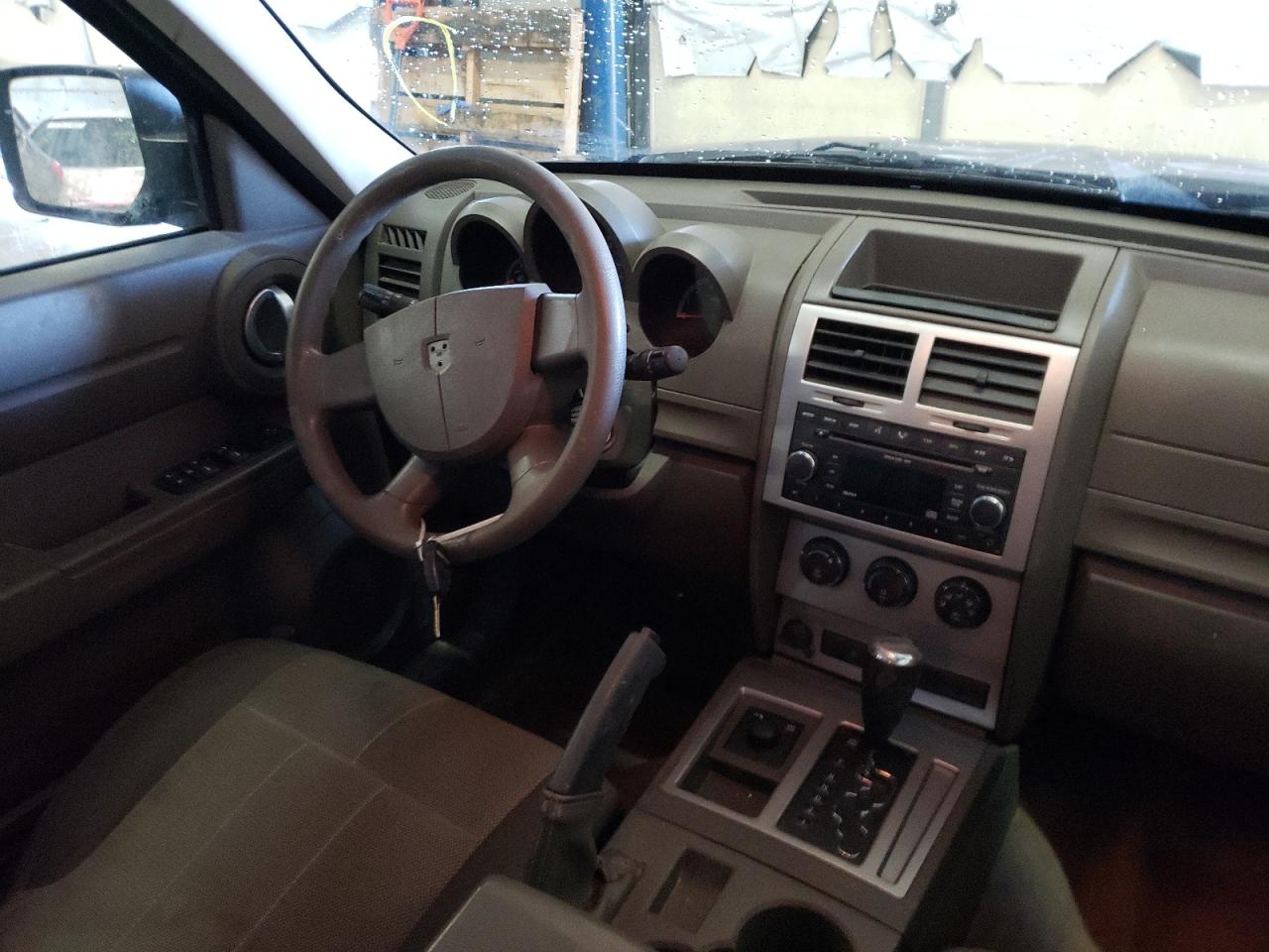 Photo 9 from auction – 2007 DODGE NITRO SXT with VIN 1D8GU28K37W549978