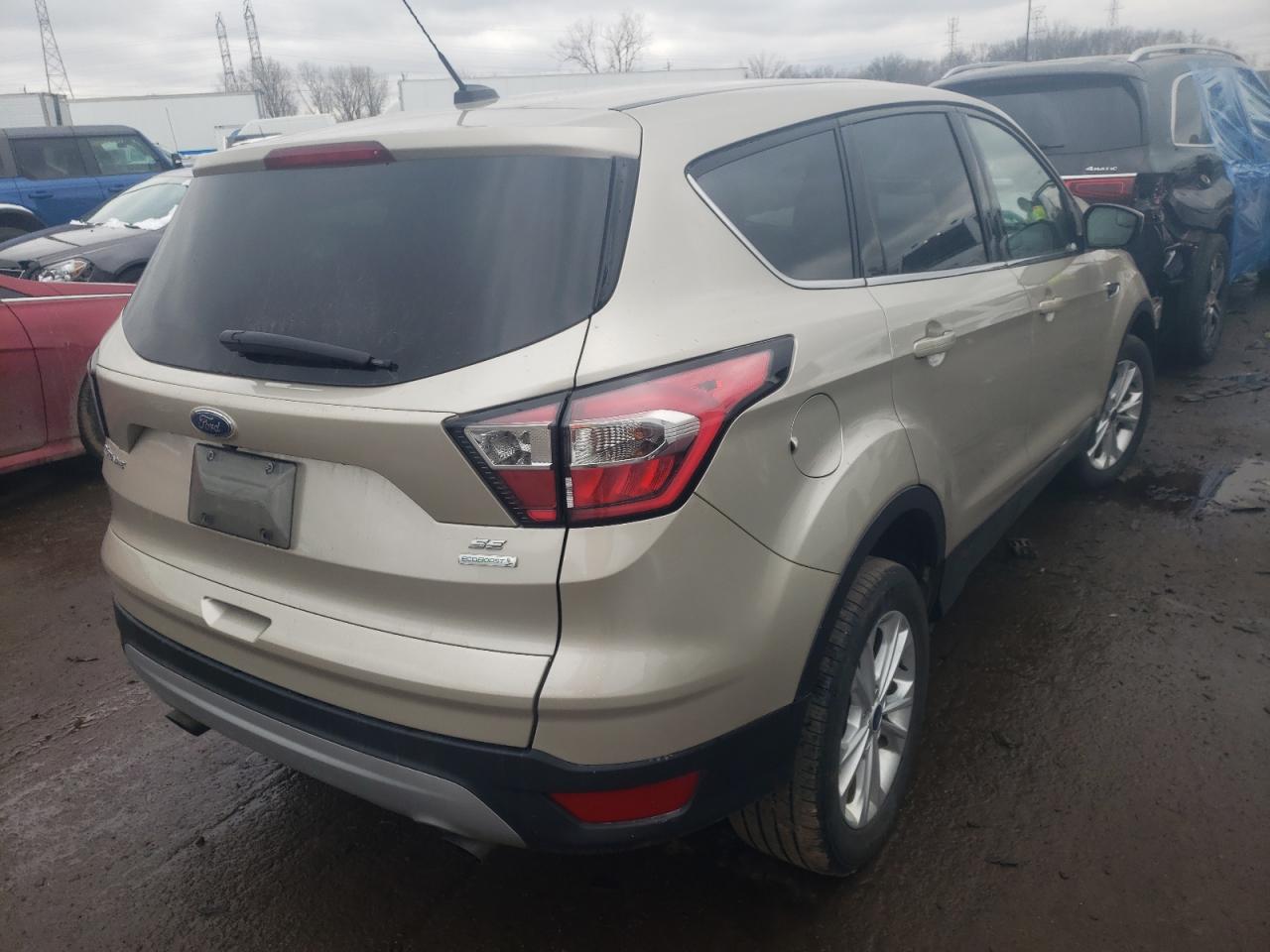 Photo 4 from auction – 2017 FORD ESCAPE SE with VIN 1FMCU0GD4HUD38642