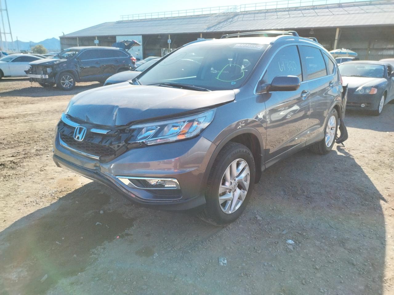 Photo 2 from auction – 2016 HONDA CR-V EX with VIN 2HKRM4H57GH725059