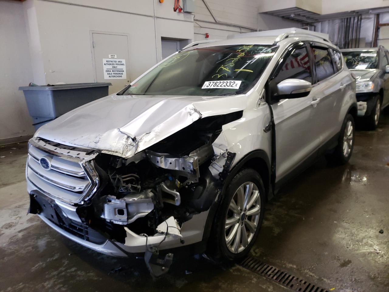Photo 2 from auction – 2017 FORD ESCAPE TIT with VIN 1FMCU9J95HUA63243