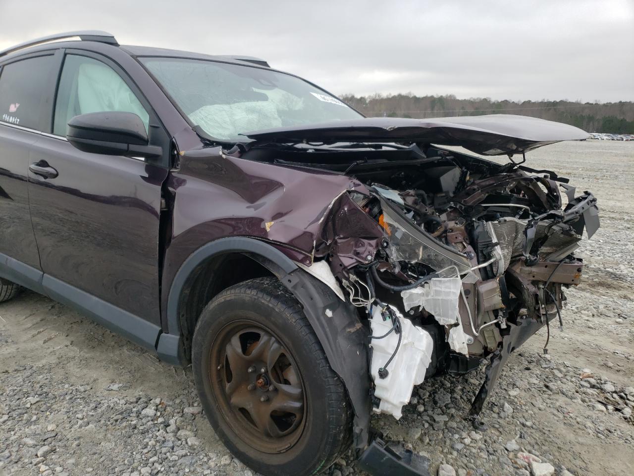 Photo 9 from auction – 2018 TOYOTA RAV4 LE with VIN 2T3ZFREV4JW422722