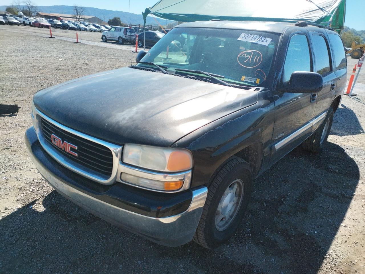 Photo 2 from auction – 2003 GMC YUKON with VIN 1GKEC13T63J327076