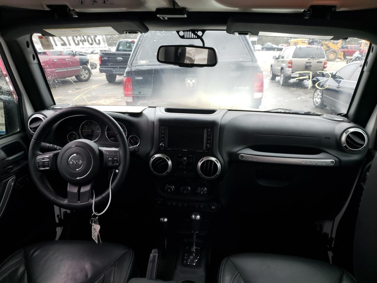 Photo 9 from auction – 2016 JEEP WRANGLER U with VIN 1C4BJWFG8GL299341