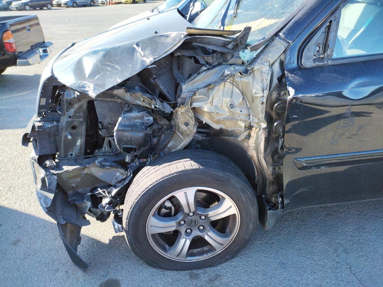 Photo 9 from auction – 2015 HONDA PILOT SE with VIN 5FNYF4H36FB048121