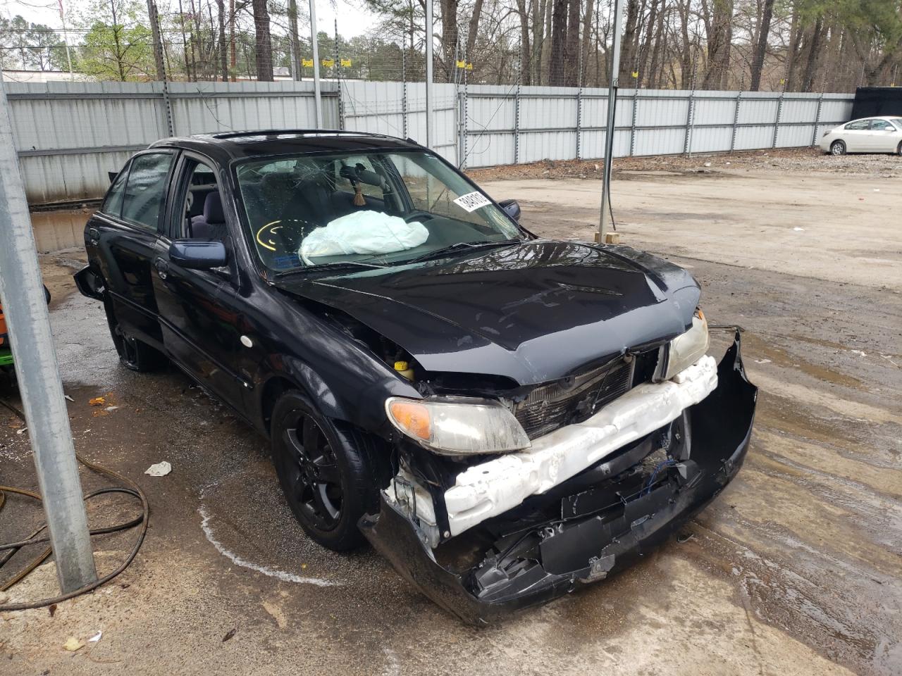 MAZDA PROTEGE DX 2003 with VIN JM1BJ225530112355 - Photo from auction