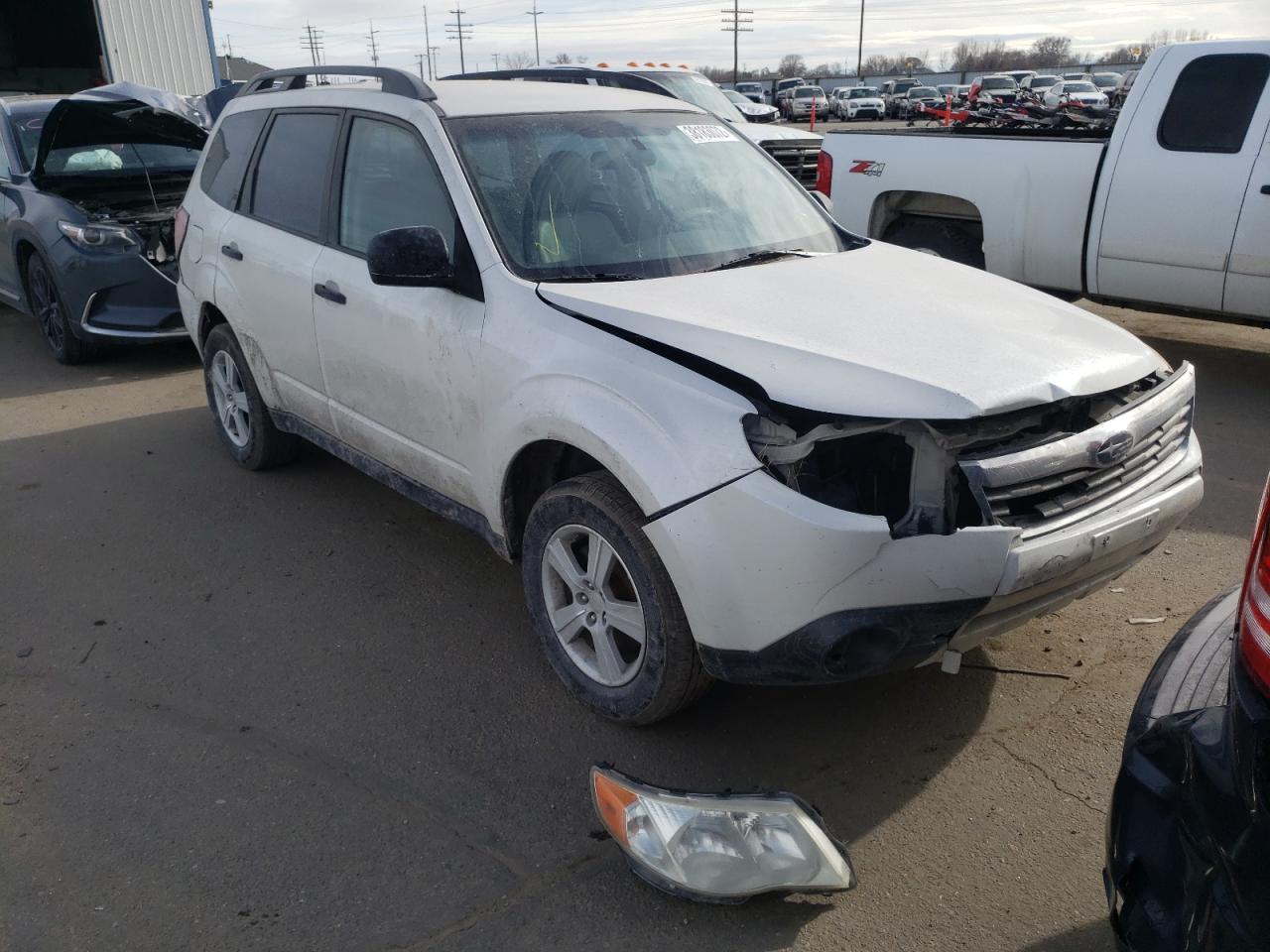 SUBARU FORESTER X 2010 with VIN JF2SH6BC7AH774049 - Photo from auction