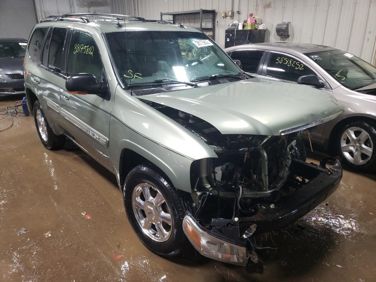 GMC ENVOY 2004 with VIN 1GKDT13S642256668 - Photo from auction