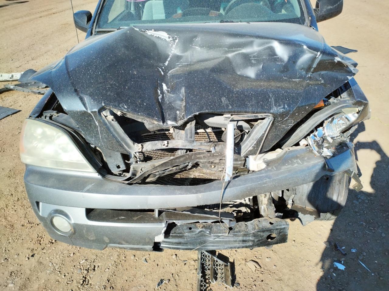 Photo 9 from auction – 2005 KIA SORENTO EX with VIN KNDJC733955369718