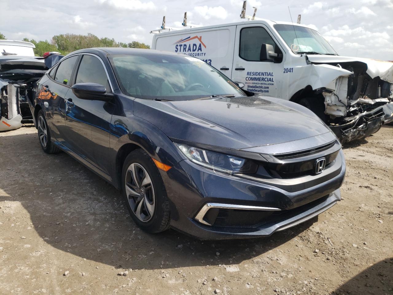 HONDA CIVIC LX 2019 with VIN 19XFC2F65KE004807 - Photo from auction