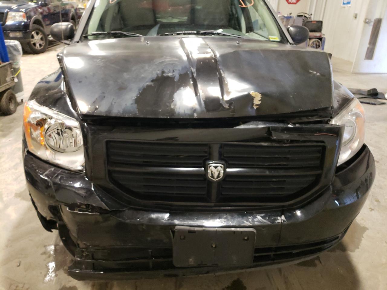 Photo 9 from auction – 2007 DODGE CALIBER SX with VIN 1B3HB48B67D412566
