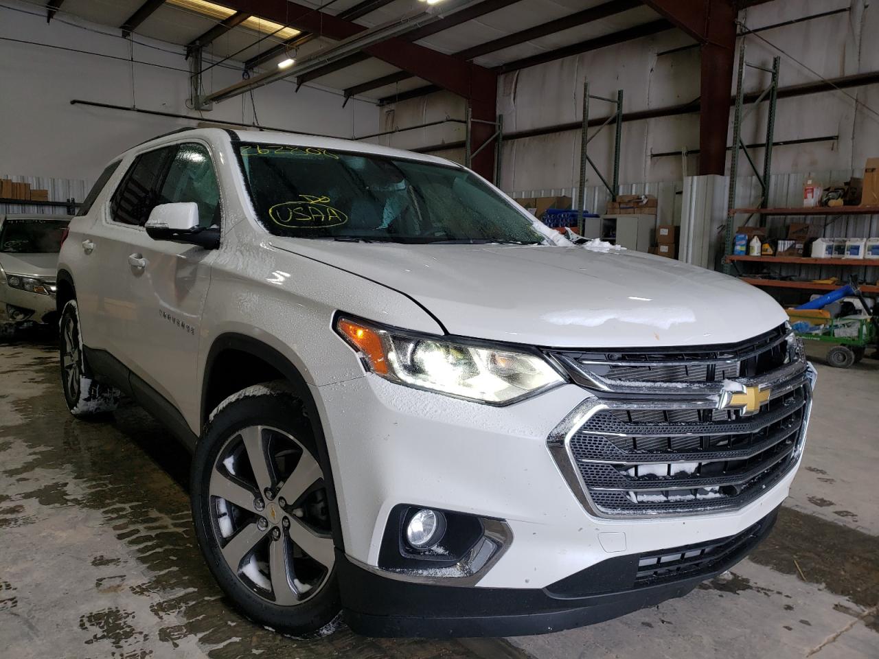 CHEVROLET TRAVERSE 2021 with VIN 1GNERHKW3MJ262808 - Photo from auction