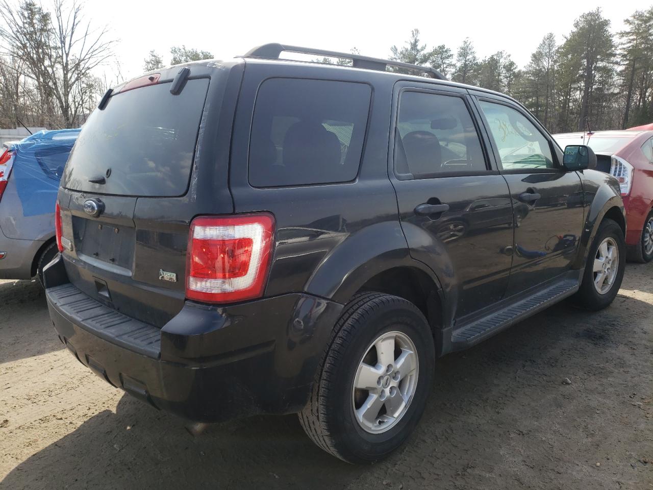 Photo 4 from auction – 2011 FORD ESCAPE XLT with VIN 1FMCU9DG2BKB69095